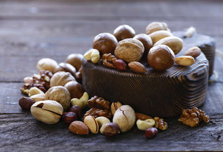 various nuts - macadas, cashews, almonds and walnuts