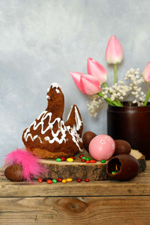 festive baking cake decorated eggs for Easterの写真素材