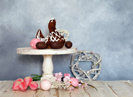 festive baking cake decorated eggs for Easterの写真素材