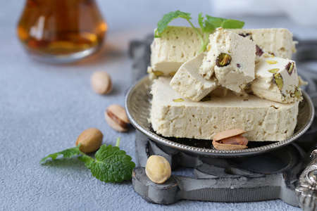 Oriental sweets - halva with pistachiosの写真素材