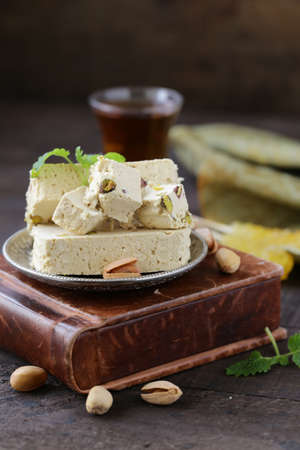 Oriental sweets - halva with pistachiosの写真素材