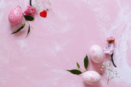 decorated eggs for Easter on a pink backgroundの写真素材