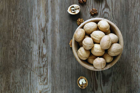 walnuts for a healthy diet on a wooden table