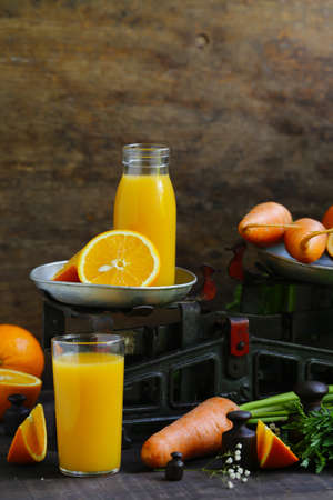 fresh orange juice from organic fruit, rustic styleの写真素材