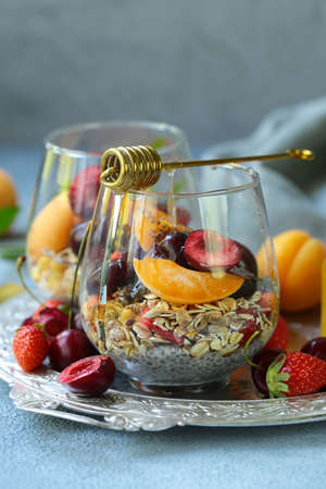 healthy breakfast chia pudding with berries and honeyの写真素材