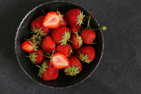 ripe organic sweet strawberries on the tableの写真素材