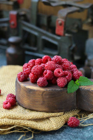 organic ripe sweet raspberries on the table