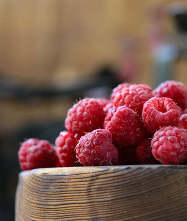 organic ripe sweet raspberries on the table