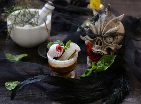 autumn still life for halloween - the witch brews a potionの写真素材