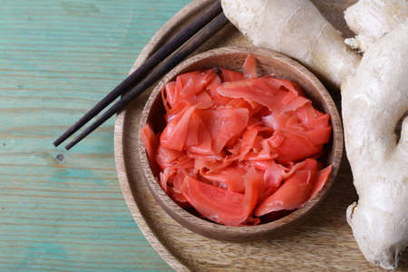 pickled pink ginger and fresh root on the table