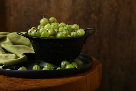 natural organic green gooseberries on the table