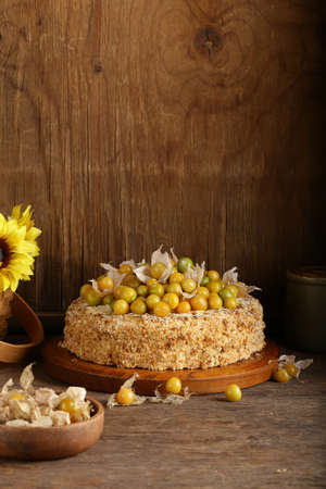 homemade sponge cake with berries and nuts