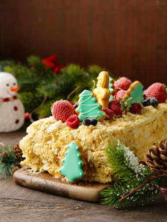 gingerbread christmas cake decoration on wooden backgroundの写真素材