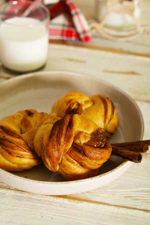 traditional Swedish cinnamon buns on the tableの写真素材