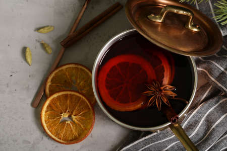 mulled wine with spices and orange, christmas winter drink