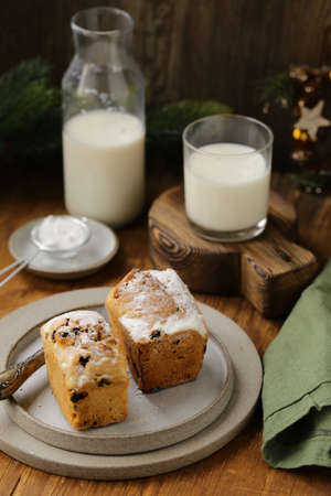 fruit cake with raisins and powdered sugarの写真素材