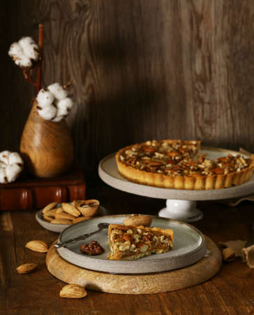 nutty tart cake with almonds and caramelの写真素材