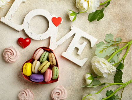 background for valentines day with flowers and sweetsの写真素材