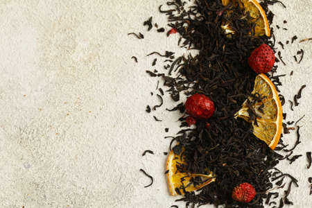 black tea with berries and fruitsの写真素材