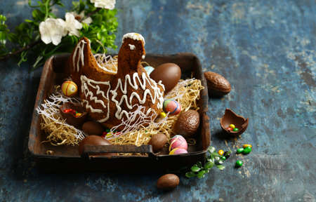 chocolate easter cake chicken and decorative eggs