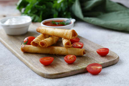 snack fried pies with cheese and sauces