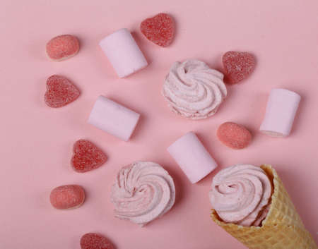 pink marshmallows in a waffle coneの写真素材