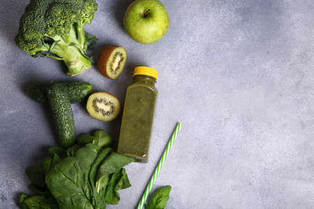 healthy green smoothie with spinach, apples and kiwiの写真素材