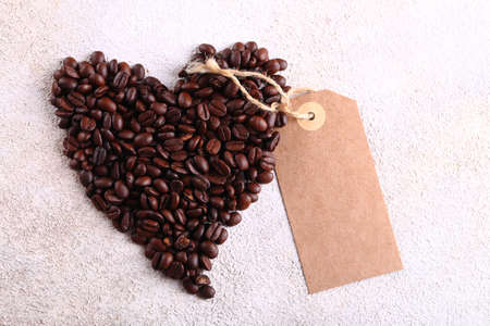 natural organic coffee beans on a light backgroundの写真素材