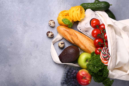 vegetables fruits and products in a shopping bag