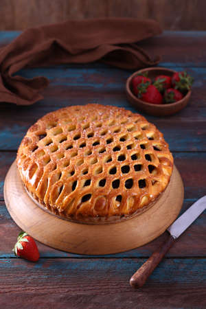 homemade sweet cake with strawberry jam on the tableの写真素材