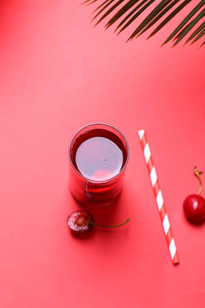 refreshing lemonade cherry juice and fresh berriesの写真素材