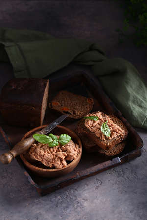 meat delicacy pate on rye bread for a snackの写真素材