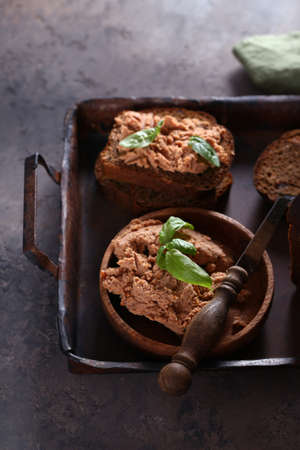 meat delicacy pate on rye bread for a snackの写真素材