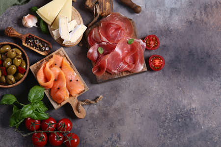 assorted ham, salmon and salami sausage - antipasti appetizerの写真素材