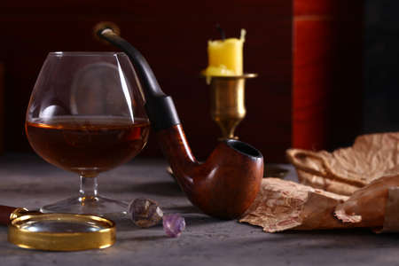 still life with a pipe for smoking and alcohol men's historyの写真素材