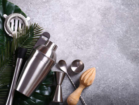 cocktail shaker and fruits on a gray backgroundの写真素材