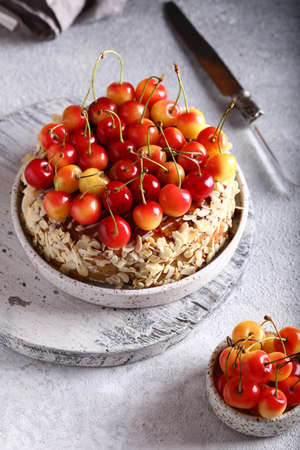 homemade berry fruit cake with fresh cherry