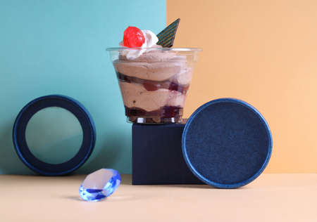 chocolate dessert in a glass on a colorful backgroundの写真素材
