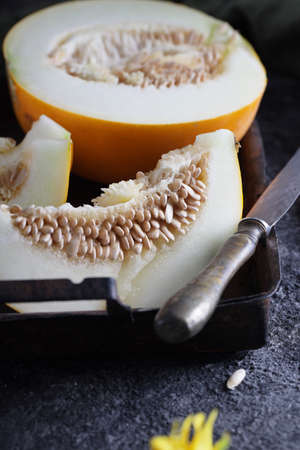 fresh ripe melon sliced on the tableの写真素材