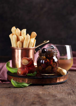 italian antipasto snacks prosciutto olives basil