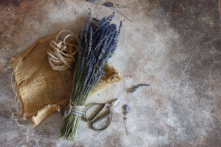 bouquet of dry lavender on a wooden tableの写真素材
