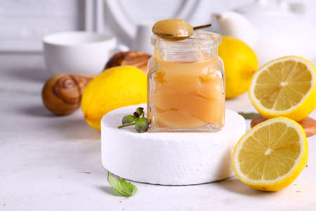 lemon curd in a glass jar for dessertの写真素材