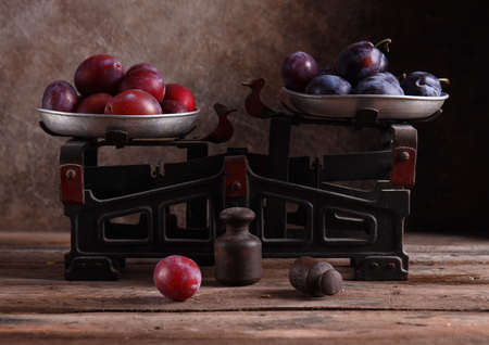 still life ripe organic fruit plumの写真素材