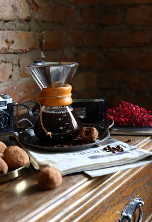 still life coffee pot kemeks with chocolatesの写真素材