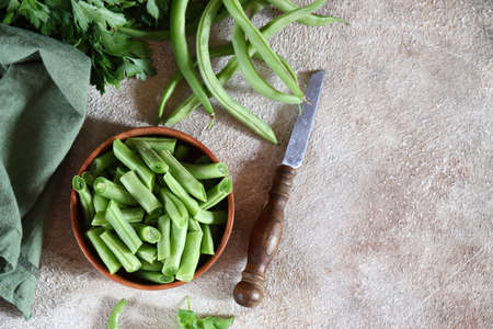 ripe organic green beans on wooden table