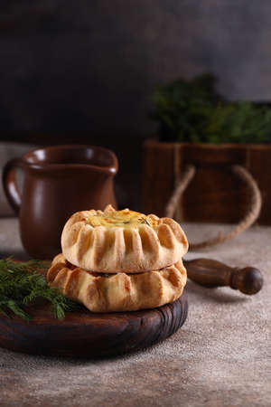 mini tartlets appetizer with cheese and herbsの写真素材