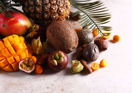 assorted tropical exotic fruits on the tableの写真素材
