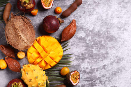 assorted tropical exotic fruits on the tableの写真素材