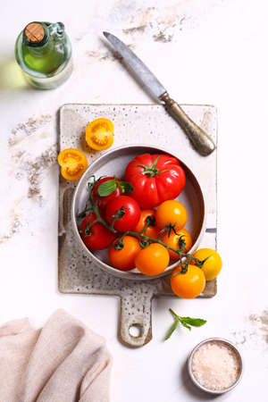 fresh organic tomatoes on the tableの写真素材