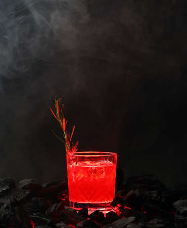 glass with an alcoholic cocktail for a holiday or partyの写真素材